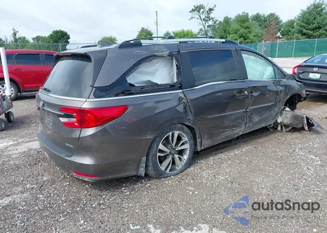 2021 Honda Odyssey Touring z USA, uszkodzony, nr VIN 5FNRL6H84MB002272